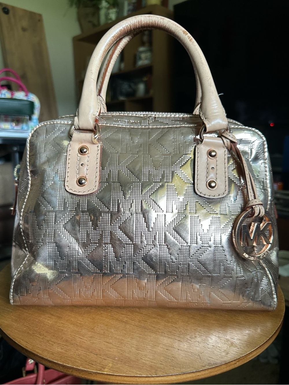 Michael Kors Mirror Metallic Satchel, featuring the signature MK monogram gold